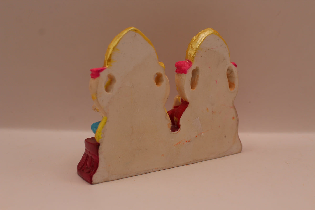 Hand painted Ganesh Laxmi resin murti pair, back view