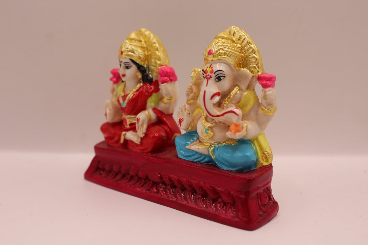Hand painted Ganesh Laxmi resin murti pair, right side view