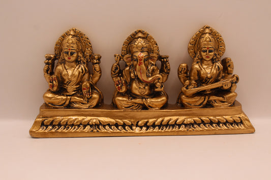 Antique gold Ganesh Laxmi Saraswati resin murti trio, front view