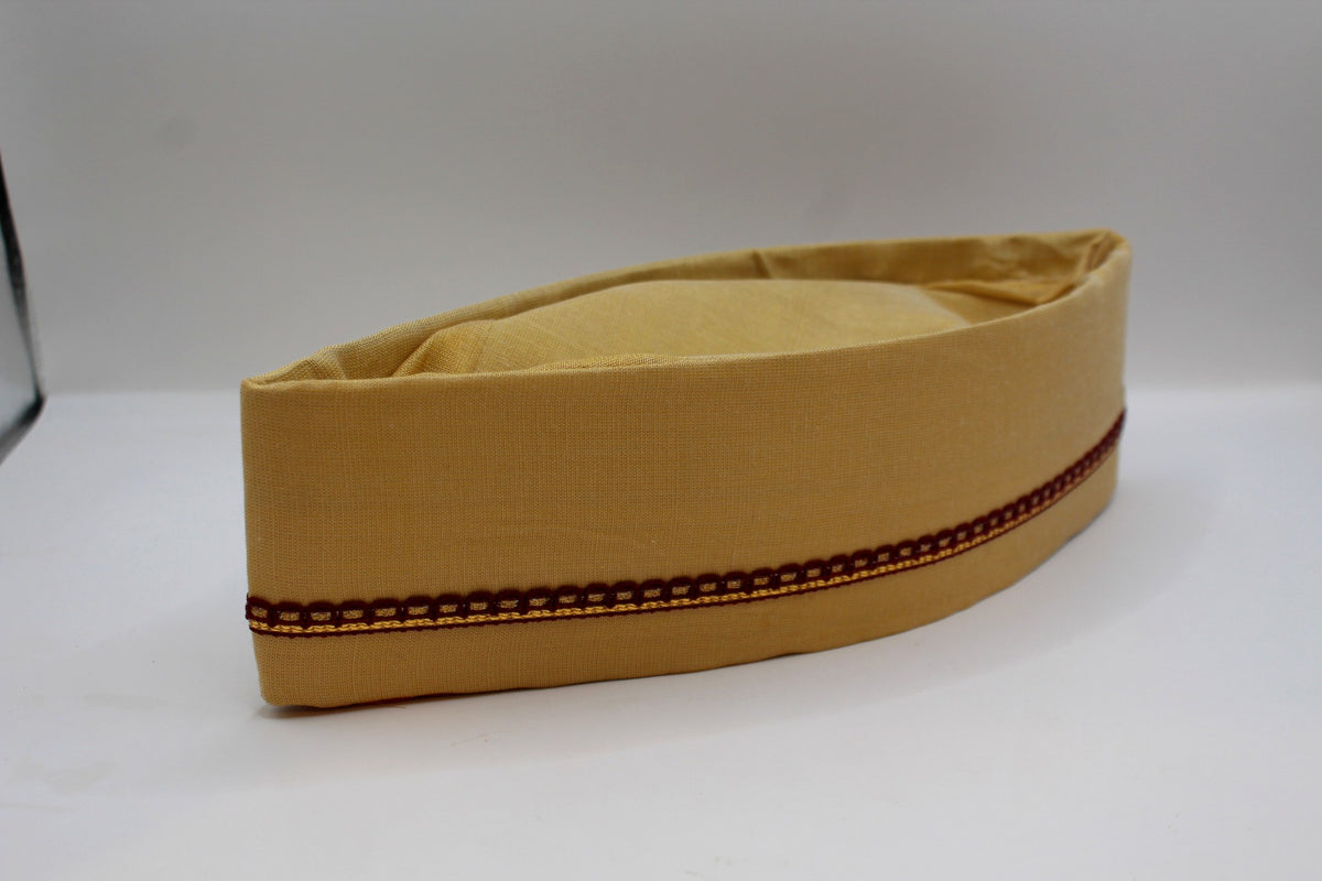 Champagne gold Gandhi topi with maroon border, side view