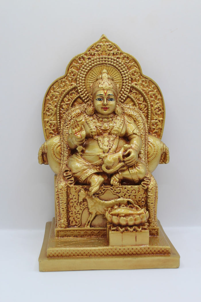 Gold resin Kuber murti seated on a throne, front view