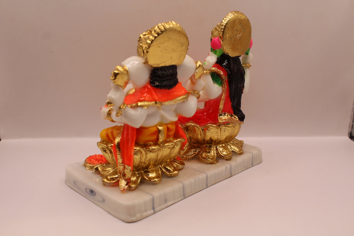 Resin Laxmi Ganesh murti pair on gold lotus seats with white base, back view