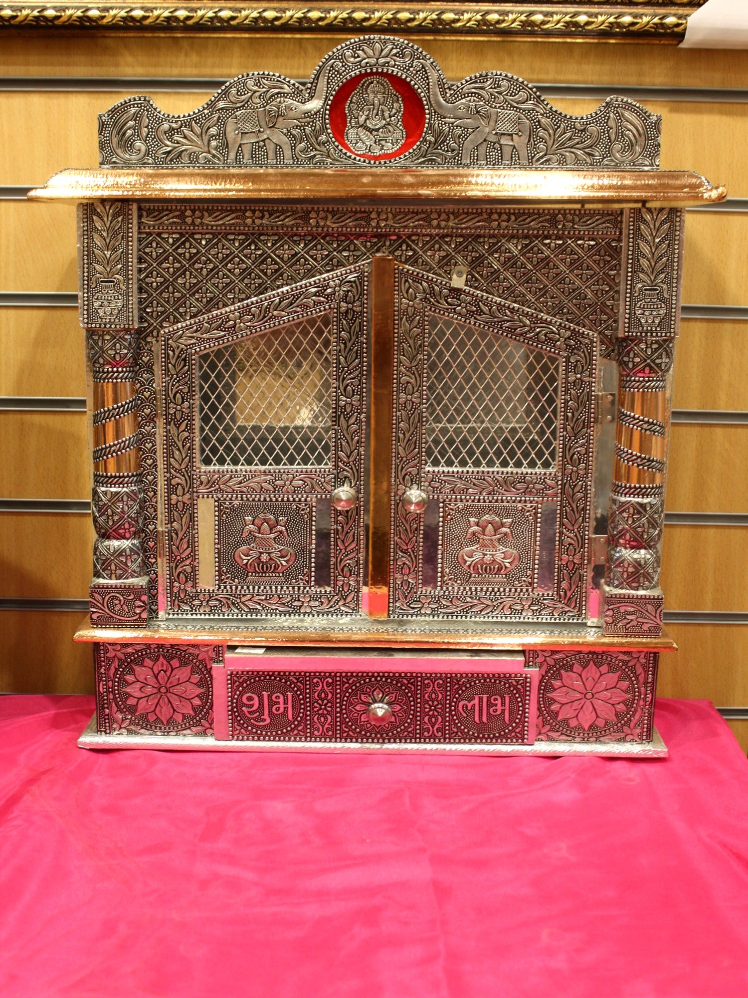 Oxidised silver mandir with jali doors and elephant crest, 18 x 6 inch, front view
