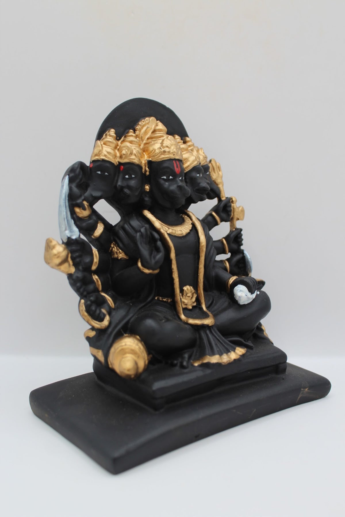 Black and gold resin Panchmukhi Hanuman murti, left side view