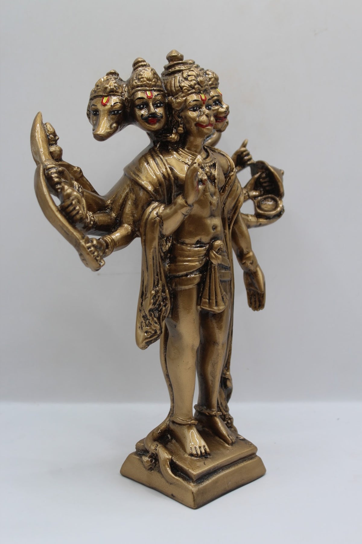 Antique gold resin Panchmukhi Hanuman murti, standing, left side view