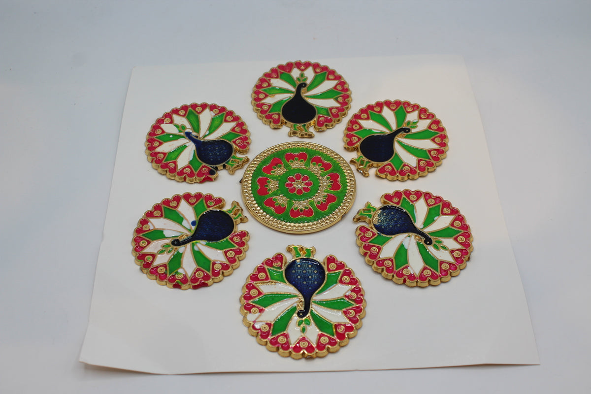 Rangoli stickers, red, green and blue peacock design – close-up