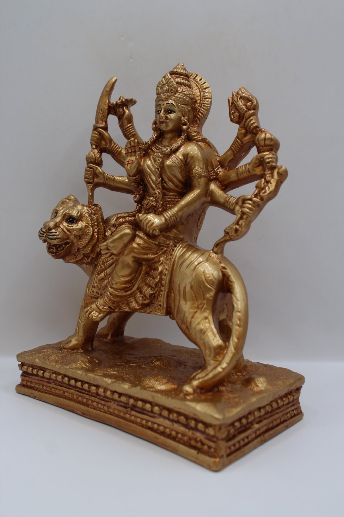 Resin Ambe Maa statue, golden finish, flat base, right side view