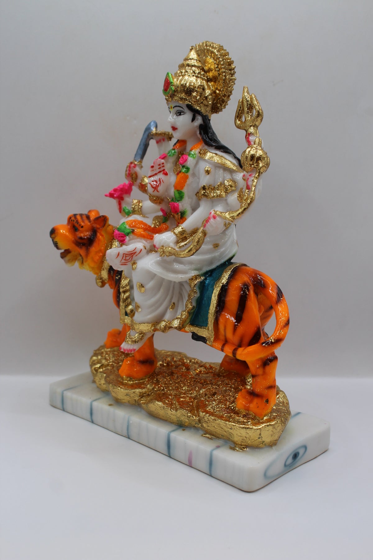 Resin Ambe Maa statue, white dress on tiger, gold base, right side view