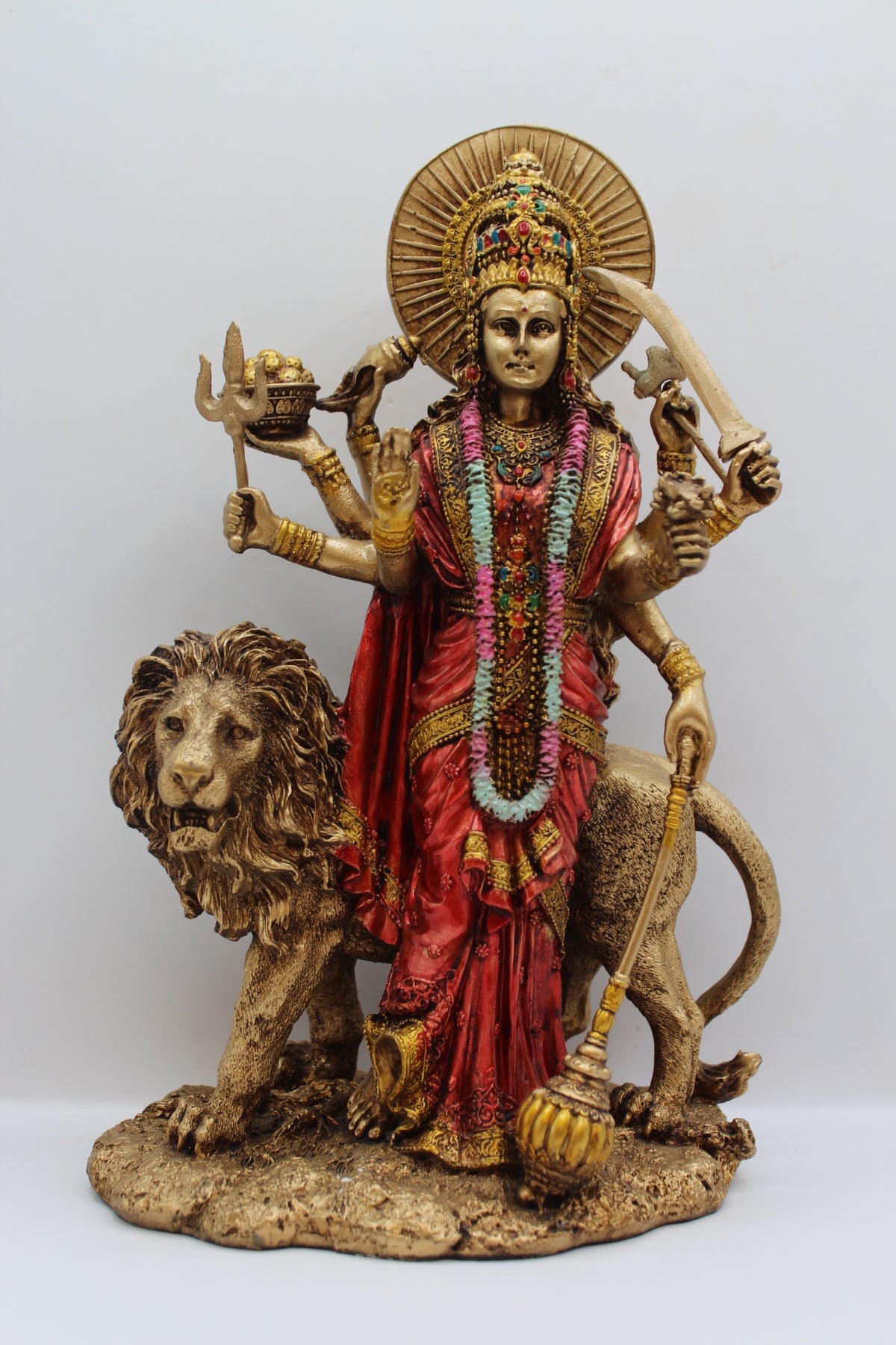 Resin Durga Maa statue, standing with lion, antique bronze, front view