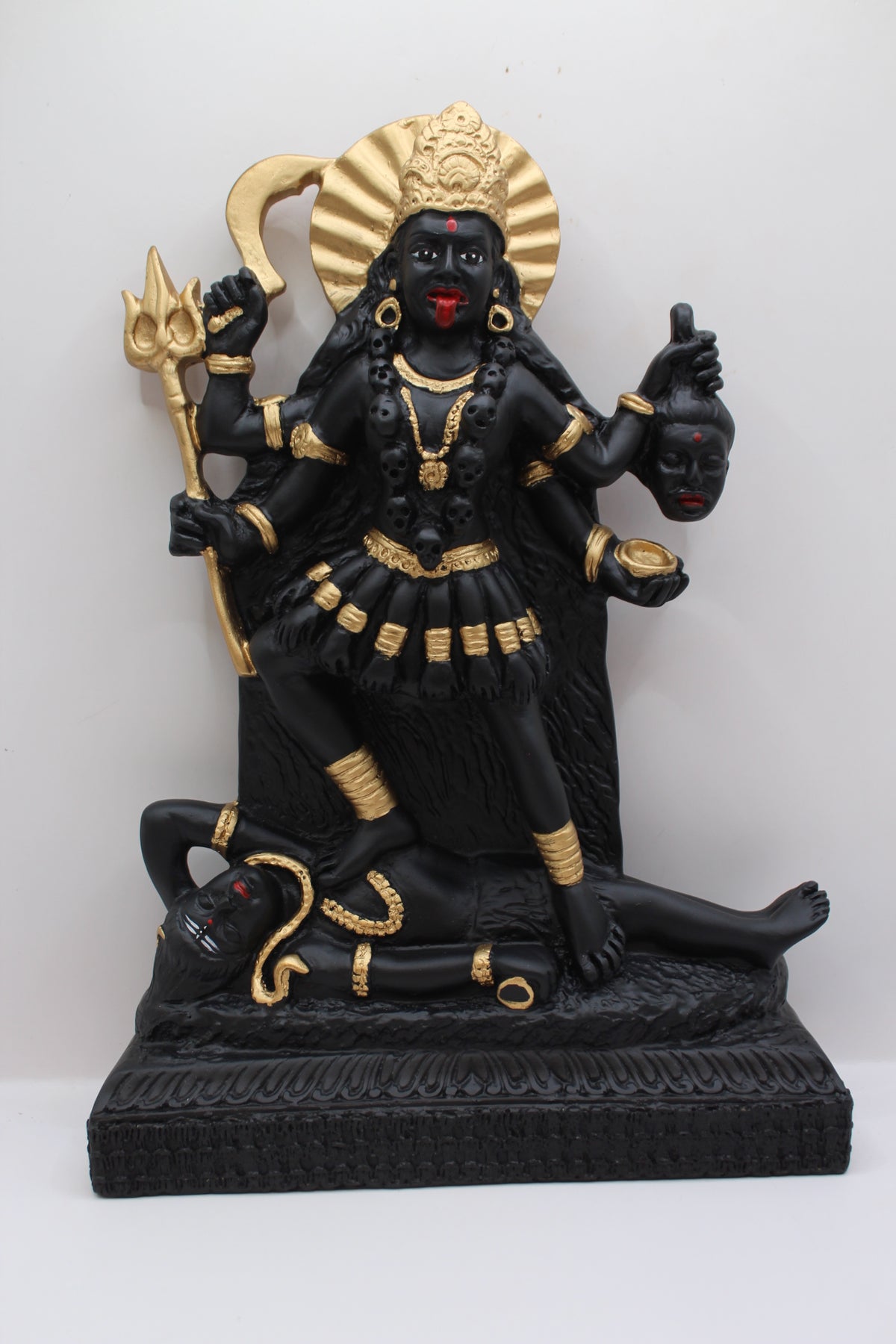 Resin Kali Mata statue, black and gold, standing, front view