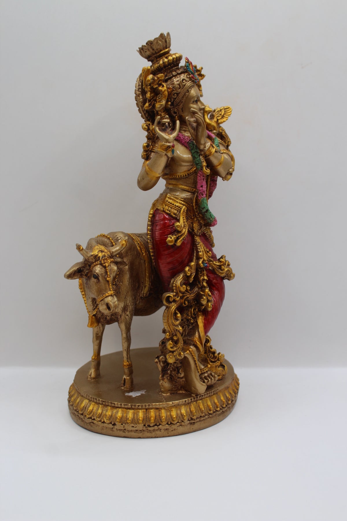 Resin Krishna with Cow statue, antique bronze finish, left side view