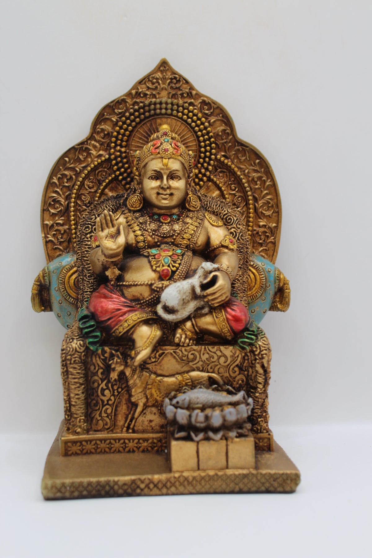 Resin Kuber statue, seated on throne, antique bronze, front view