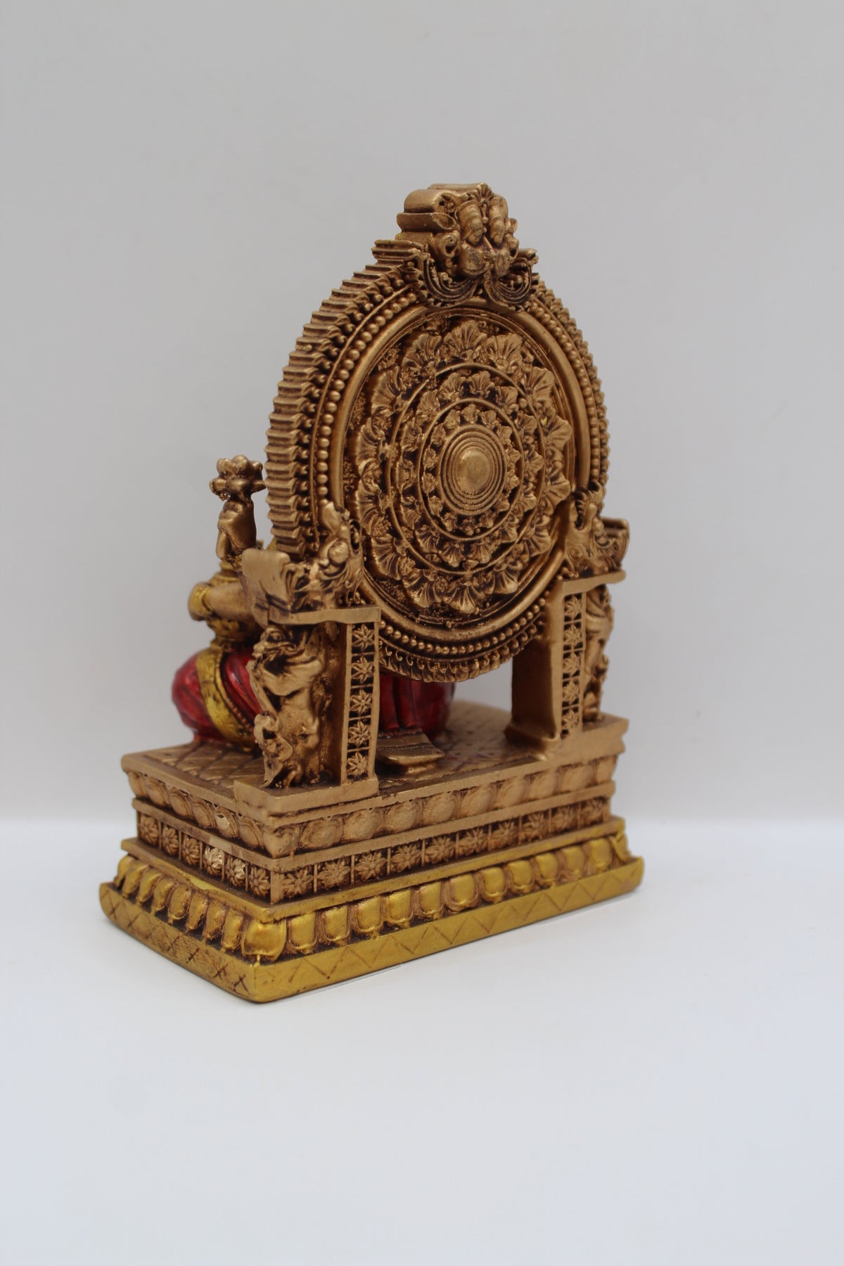Resin Laxmi statue, seated on throne, antique bronze, back view