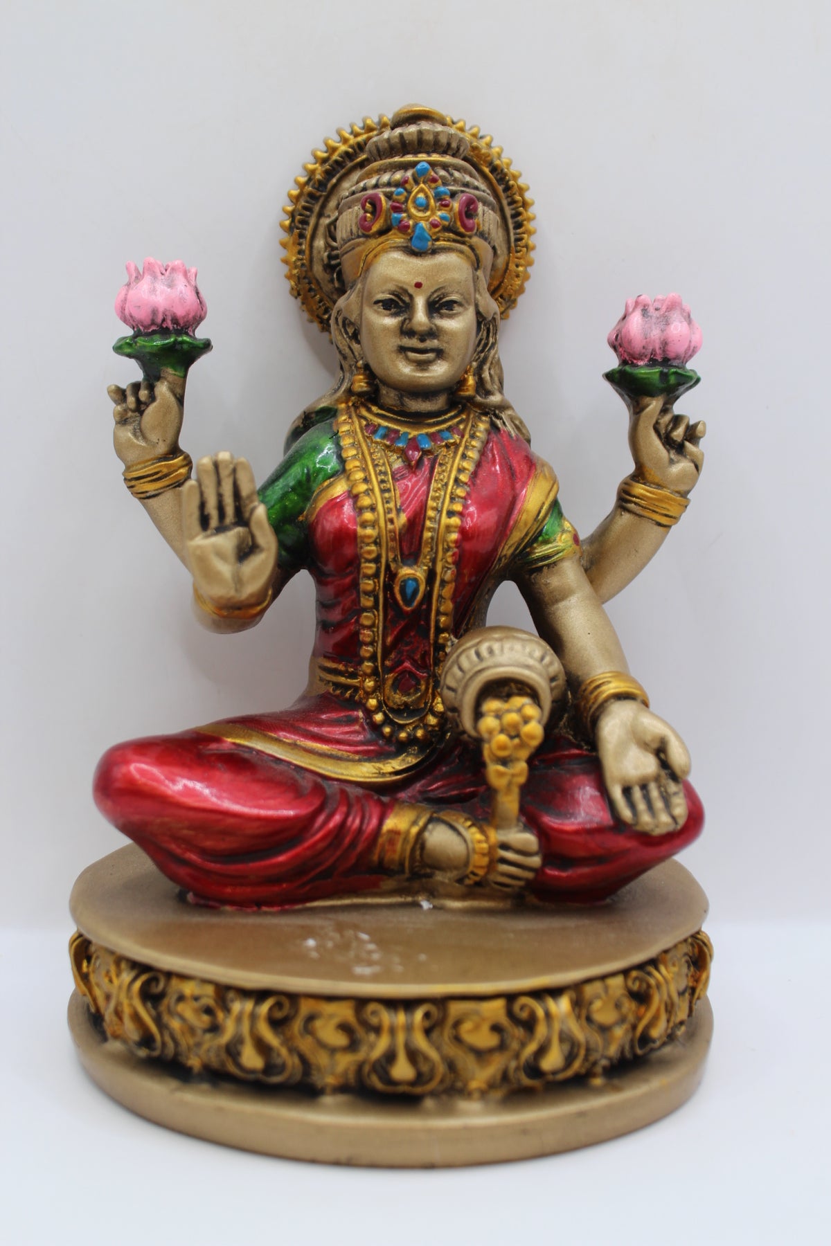 Resin Laxmi statue, with lotus flowers, antique bronze, front view
