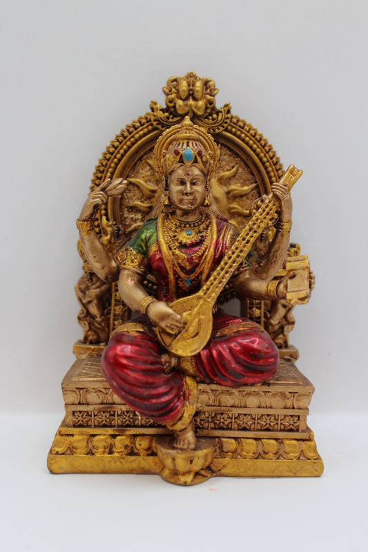 Resin Saraswati statue, seated on throne, antique bronze, front view