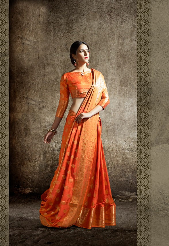 Model wearing an orange silk saree - Shri Venilals, Ealing Road, Wembley