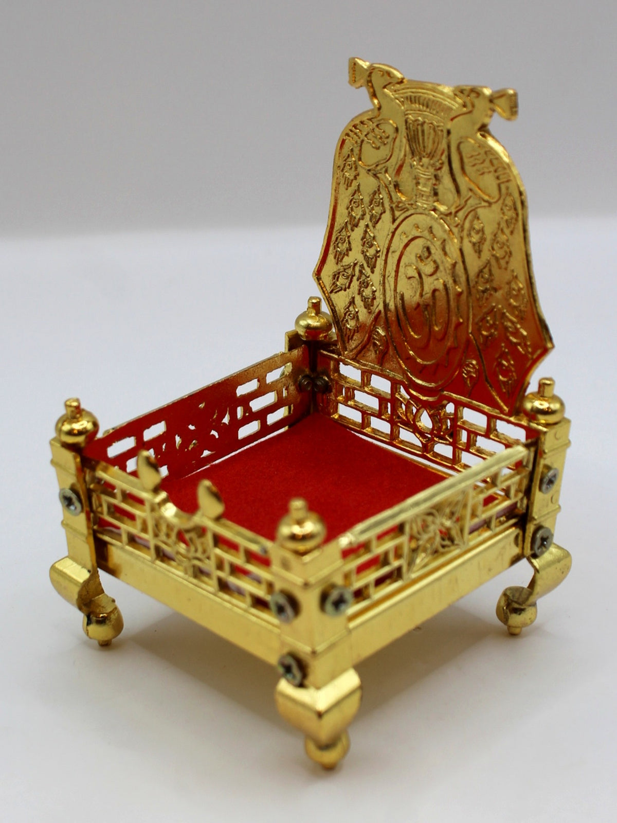 Gold metal sinhasan with red velvet seat, 6 x 6 x 10, side angle