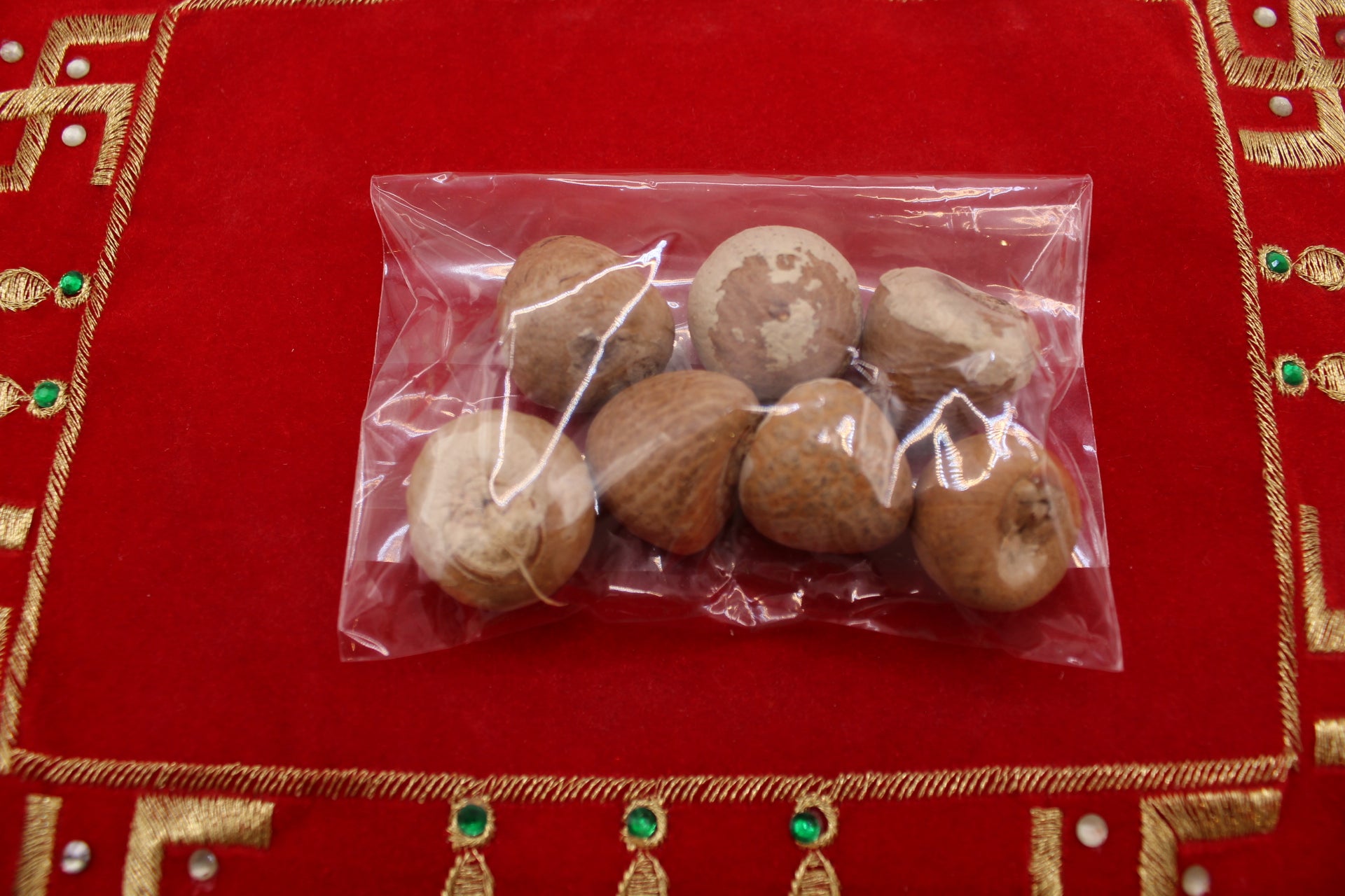 Supari betel nuts, pack of 7, close-up of single nut