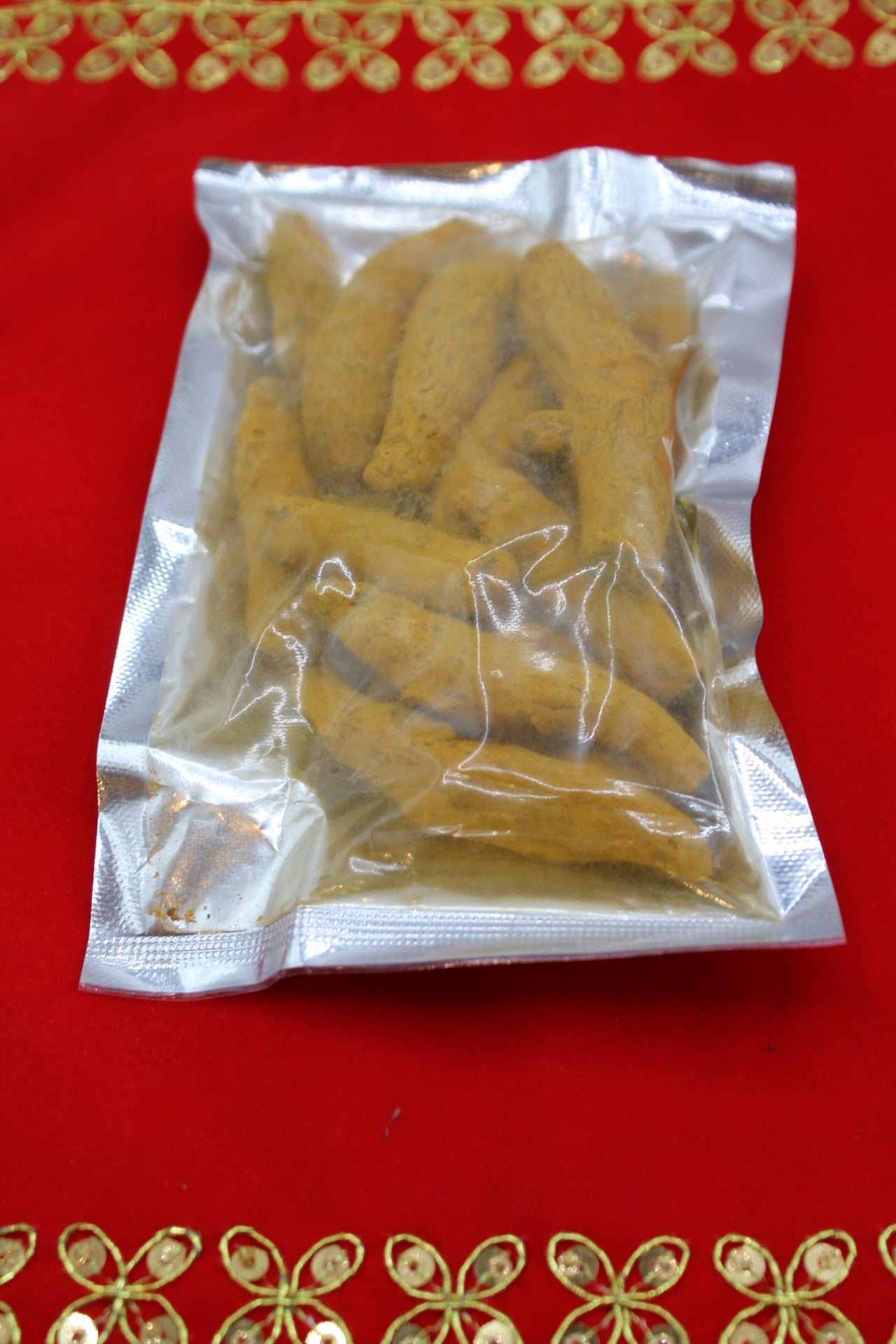 Whole dried turmeric fingers, 100g pack for pooja use