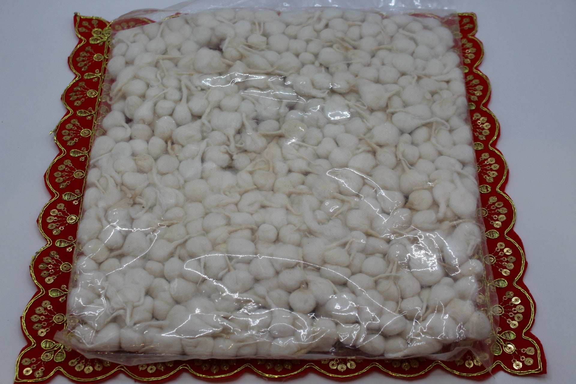 Hand-rolled cotton phool vati diya wicks in small, medium and large packs