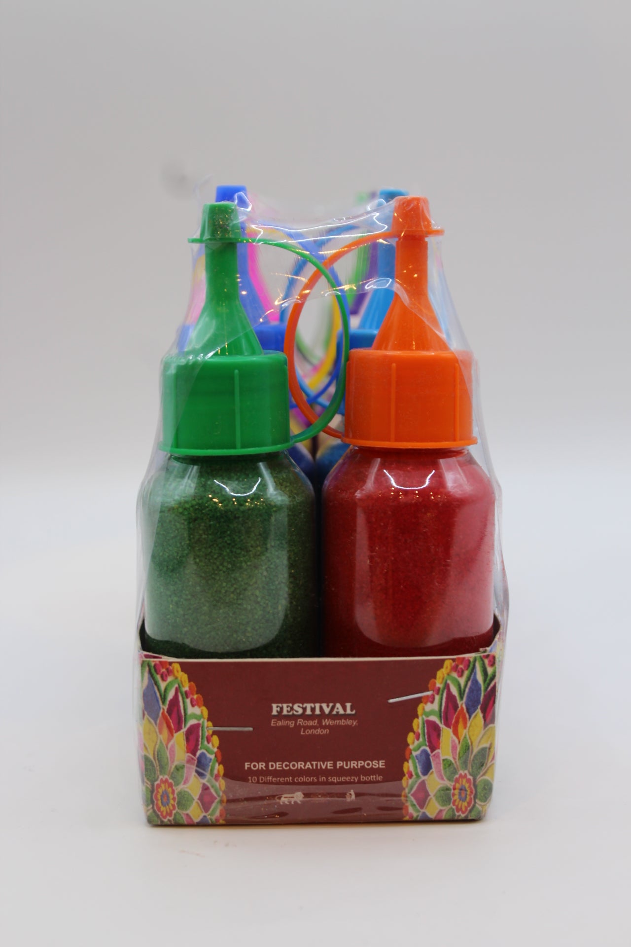Rangoli colour bottles in orange, pink, yellow, purple and green