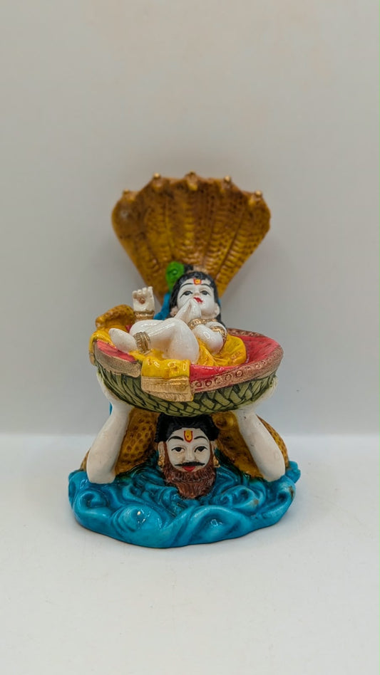 Vasudev carrying baby Krishna statue, front view
