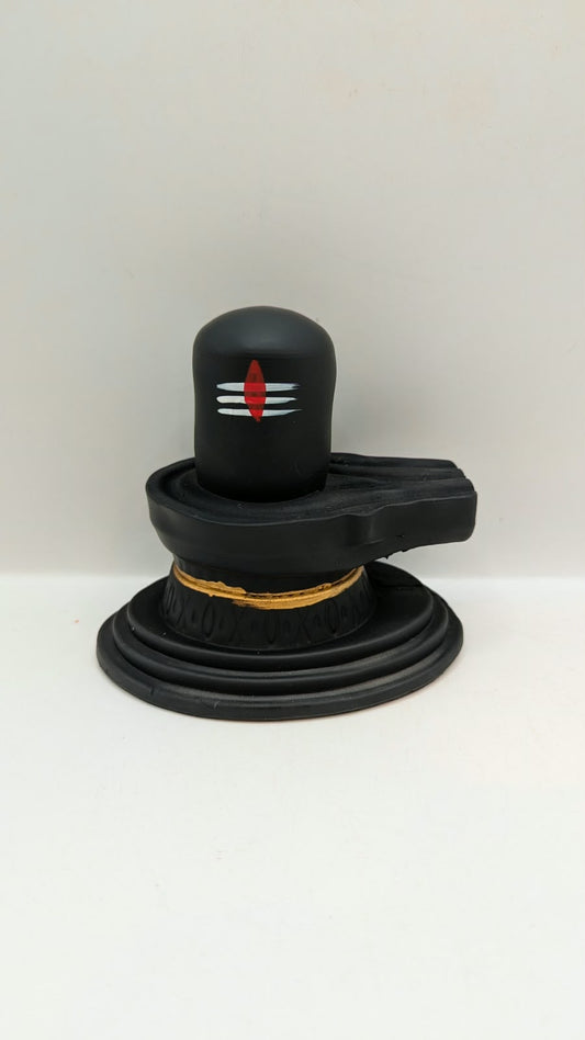 Matt black Shivling statue, front view