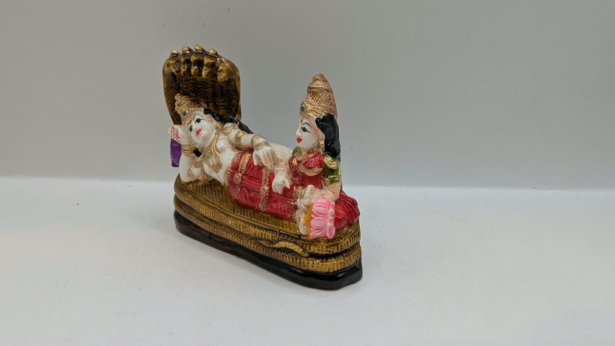 Vishnu Laxmi statue reclining on Sheshnag, other side view