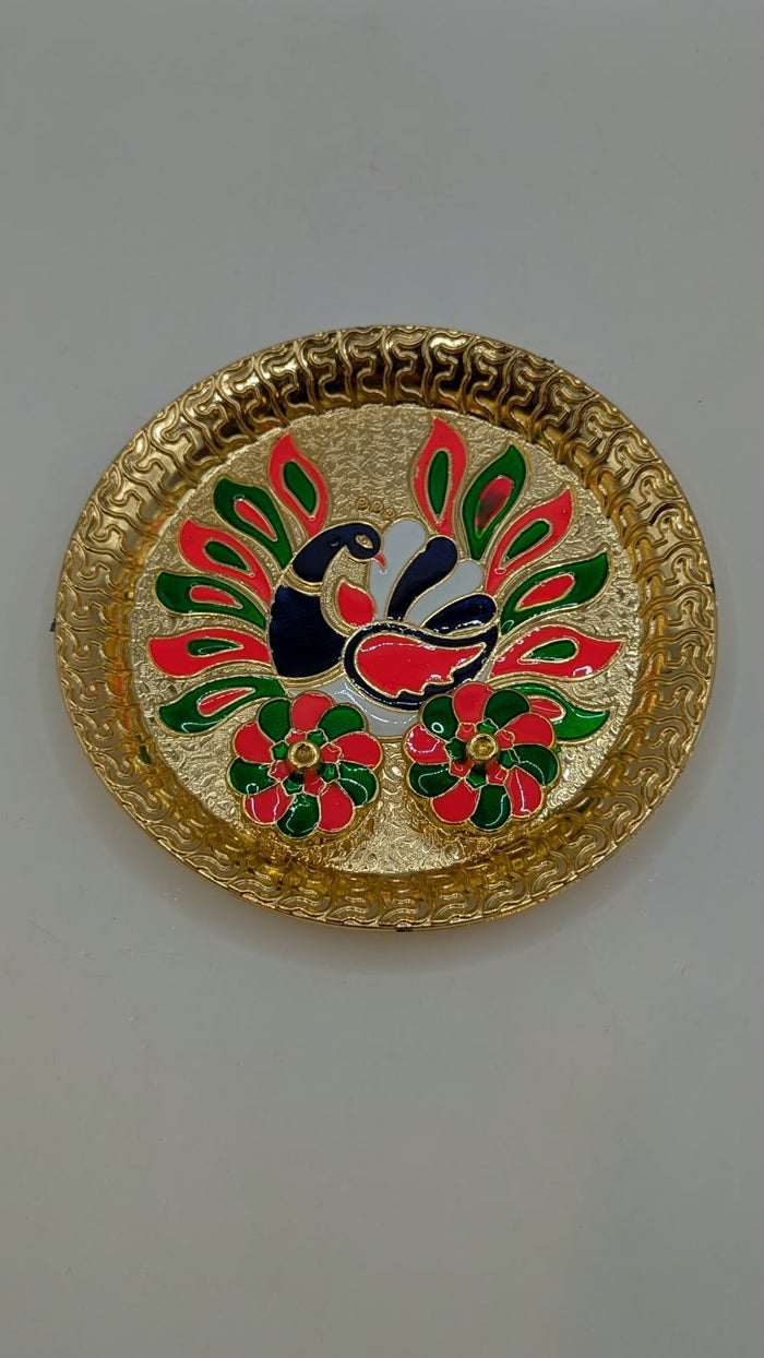 Gold peacock design puja thali, top view