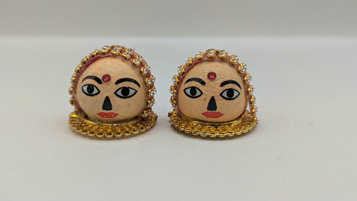 Riddhi Siddhi faces pair, front view