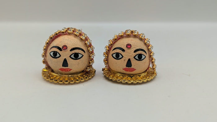 Riddhi Siddhi faces pair, front view