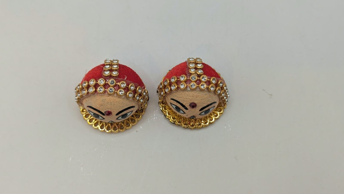 Riddhi Siddhi faces pair, side view
