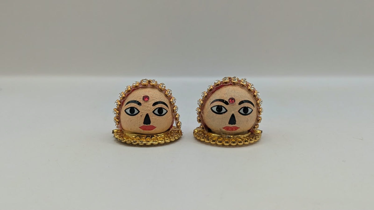 Riddhi Siddhi faces pair, other side view