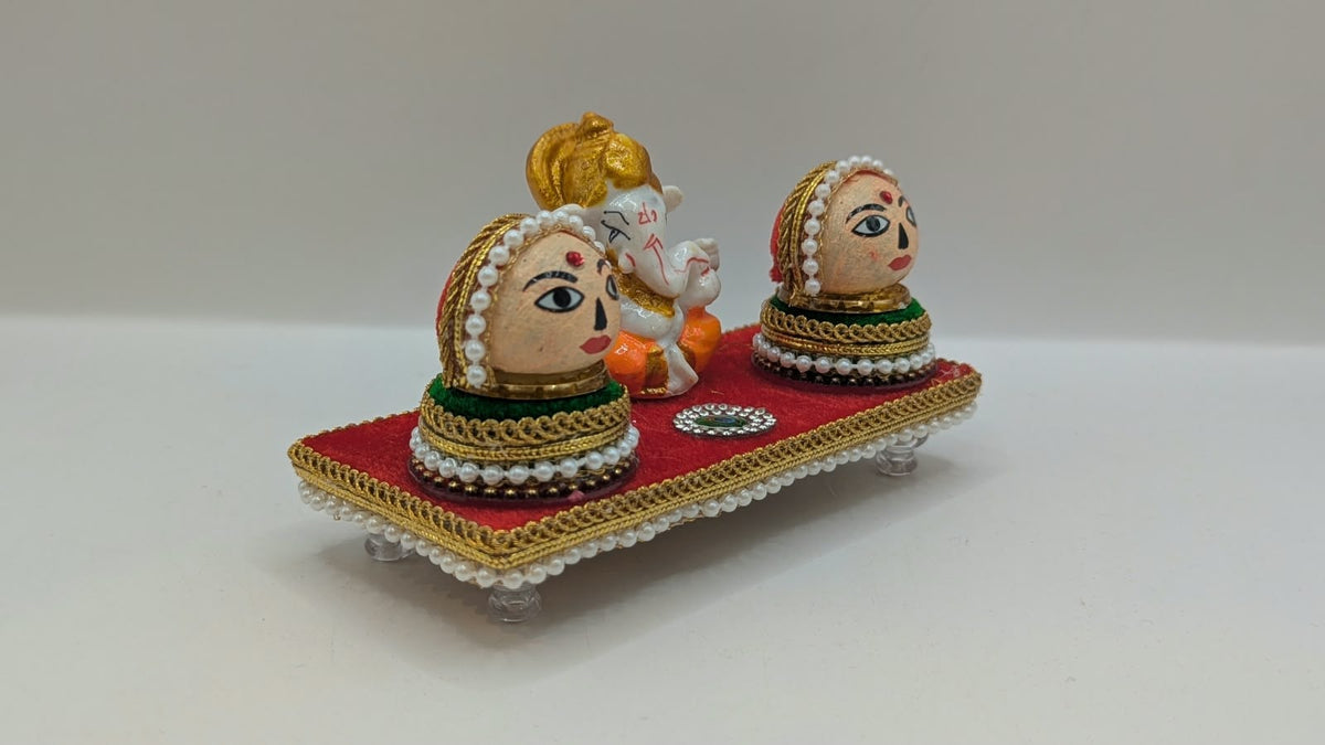 Ganesh Riddhi Siddhi set on red chowki, other side view