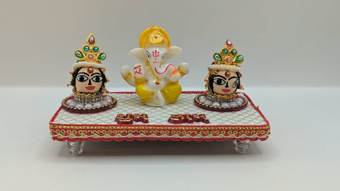 Ganesh Riddhi Siddhi set on white chowki, front view