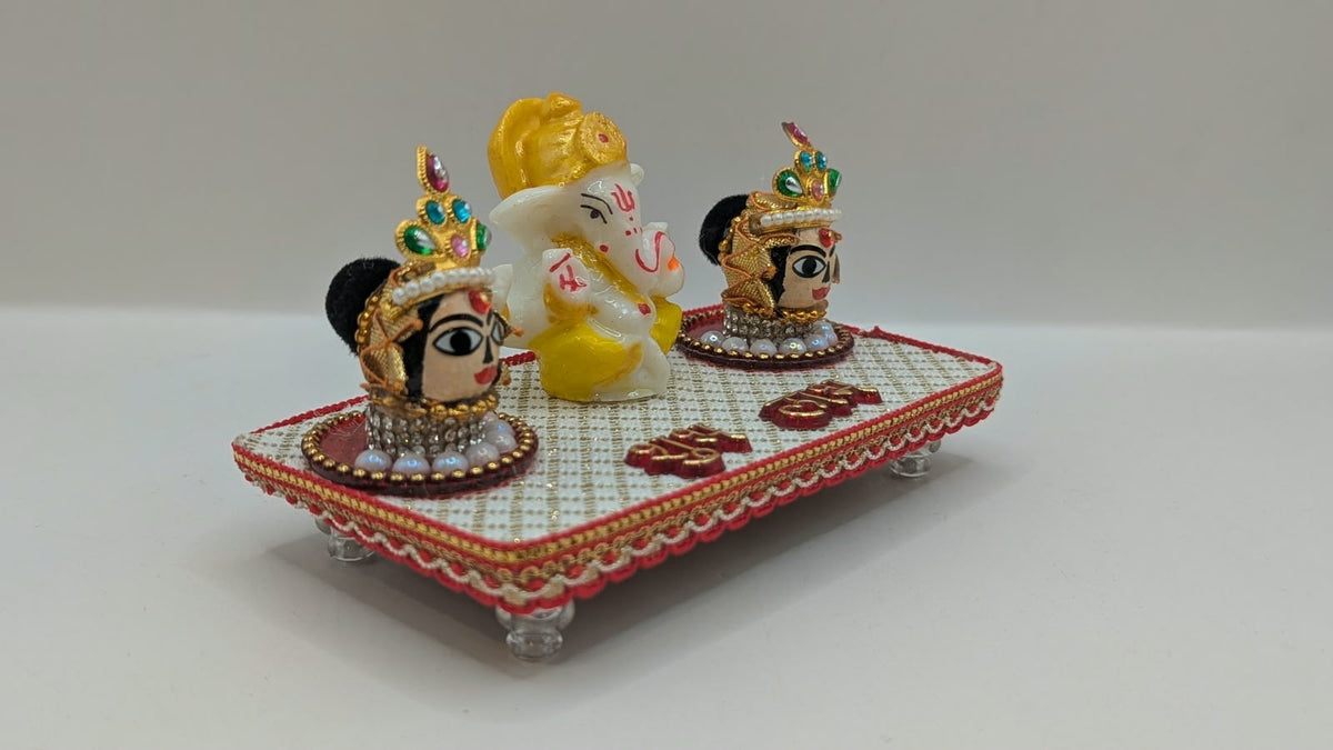 Ganesh Riddhi Siddhi set on white chowki, other side view