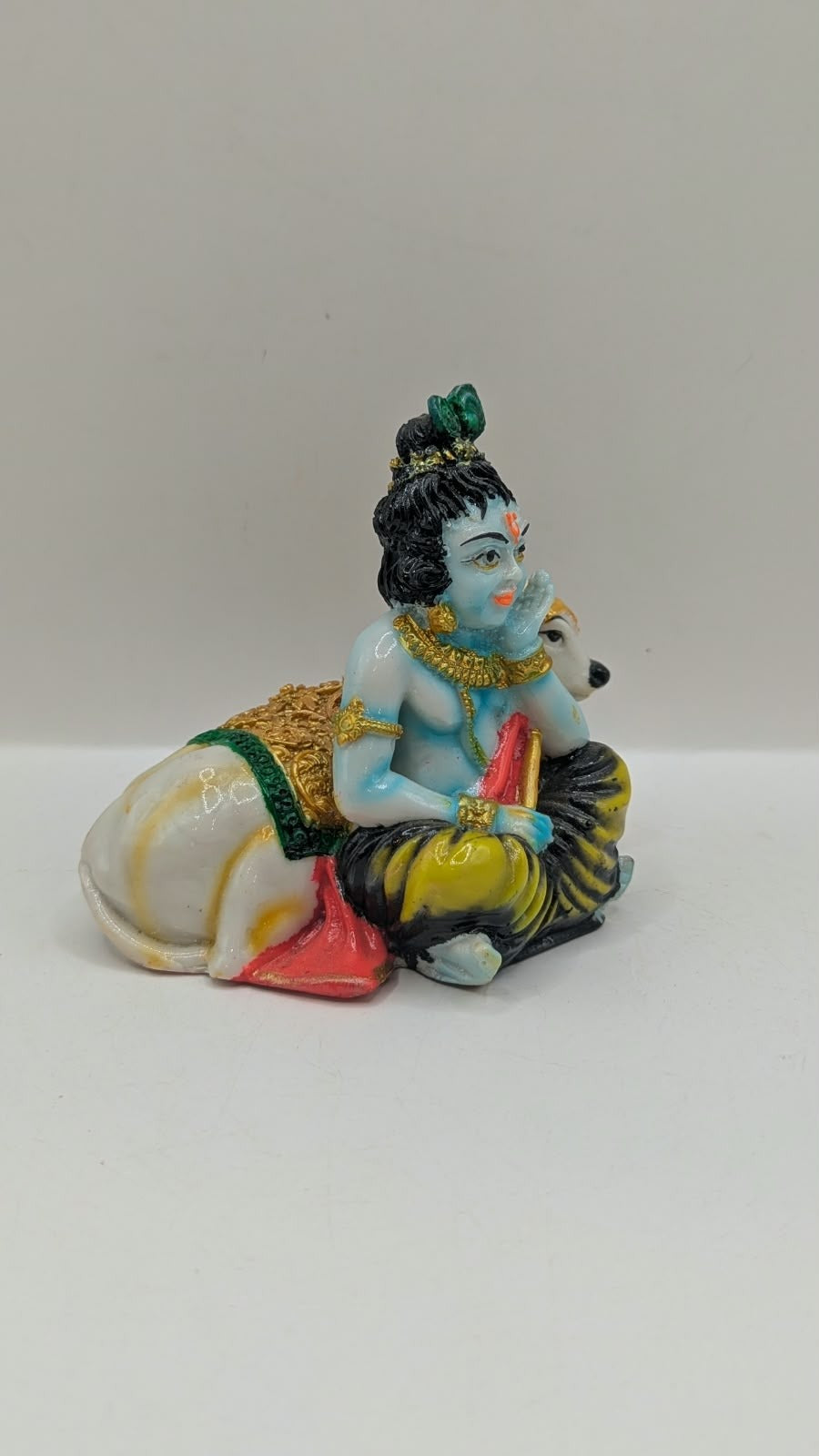 Krishna with cow statue, other side view