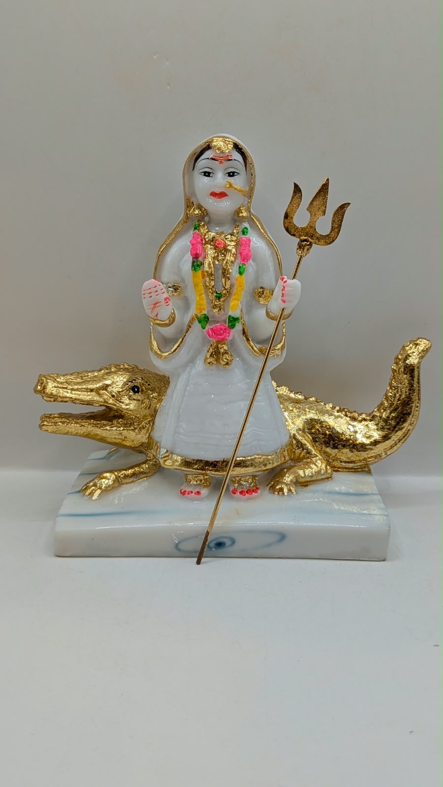 White and gold Khodiyar Maa statue, front view