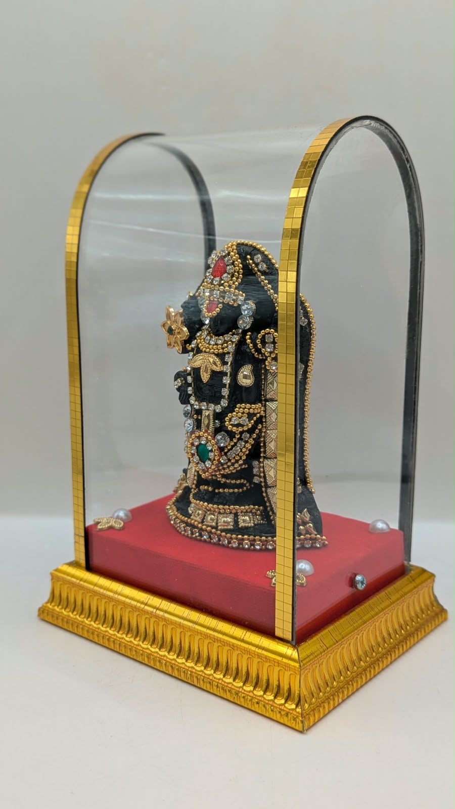 Tirupati Balaji murti in clear case, other side view