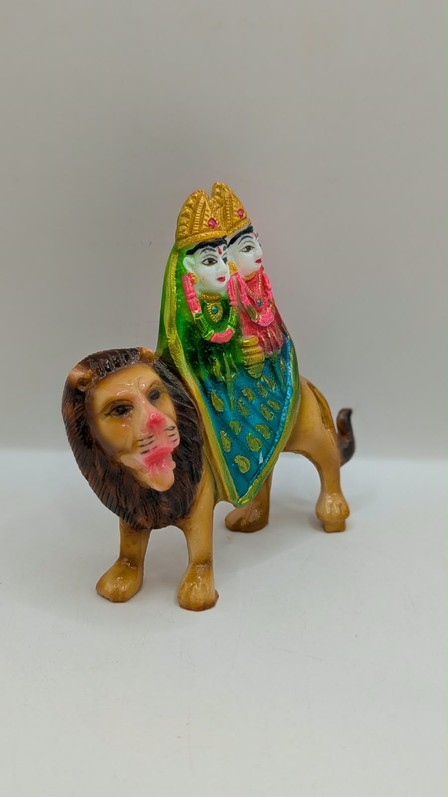 Chamunda Maa on lion statue, side view