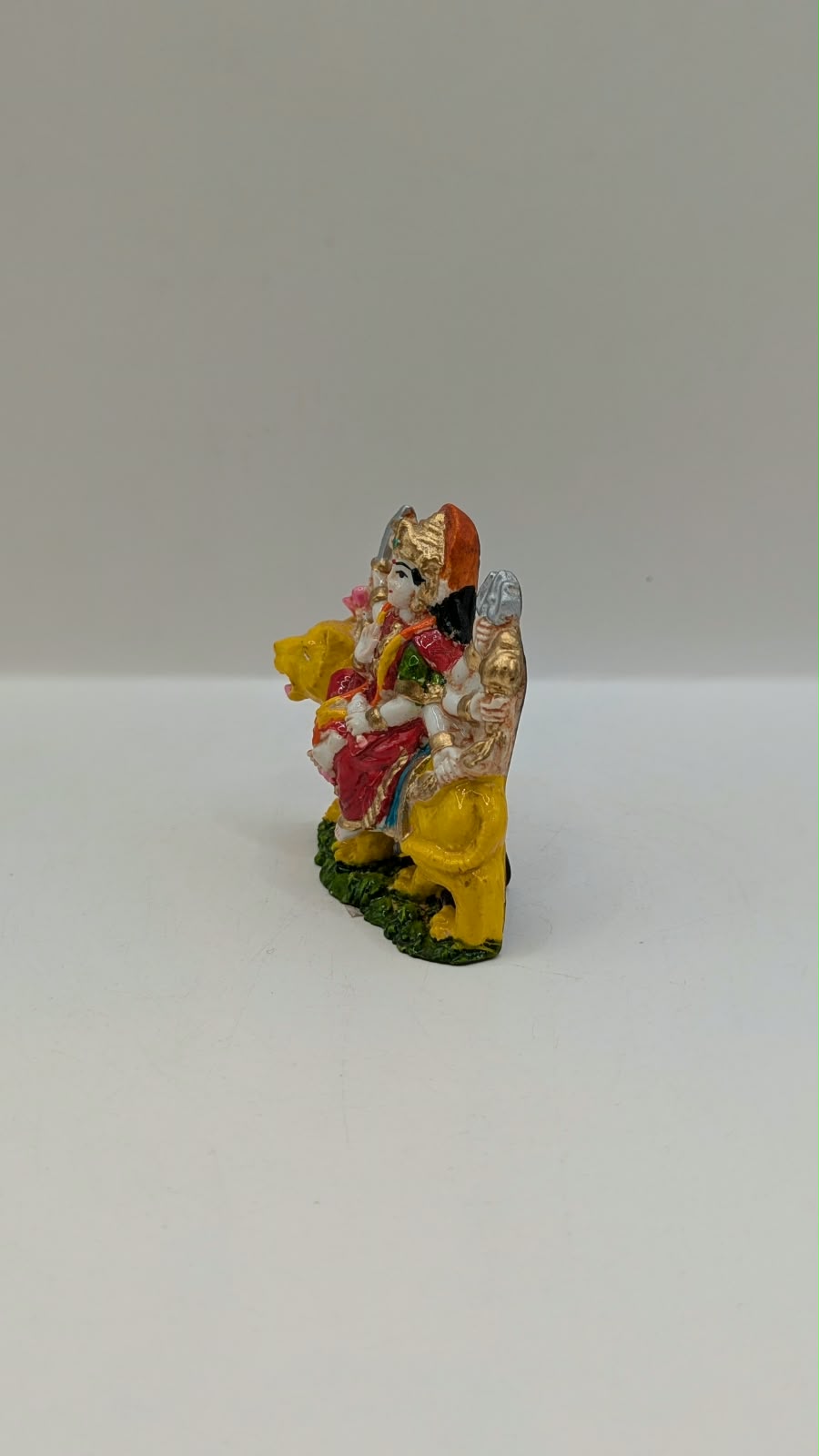 Small Durga Maa on lion statue, other side view