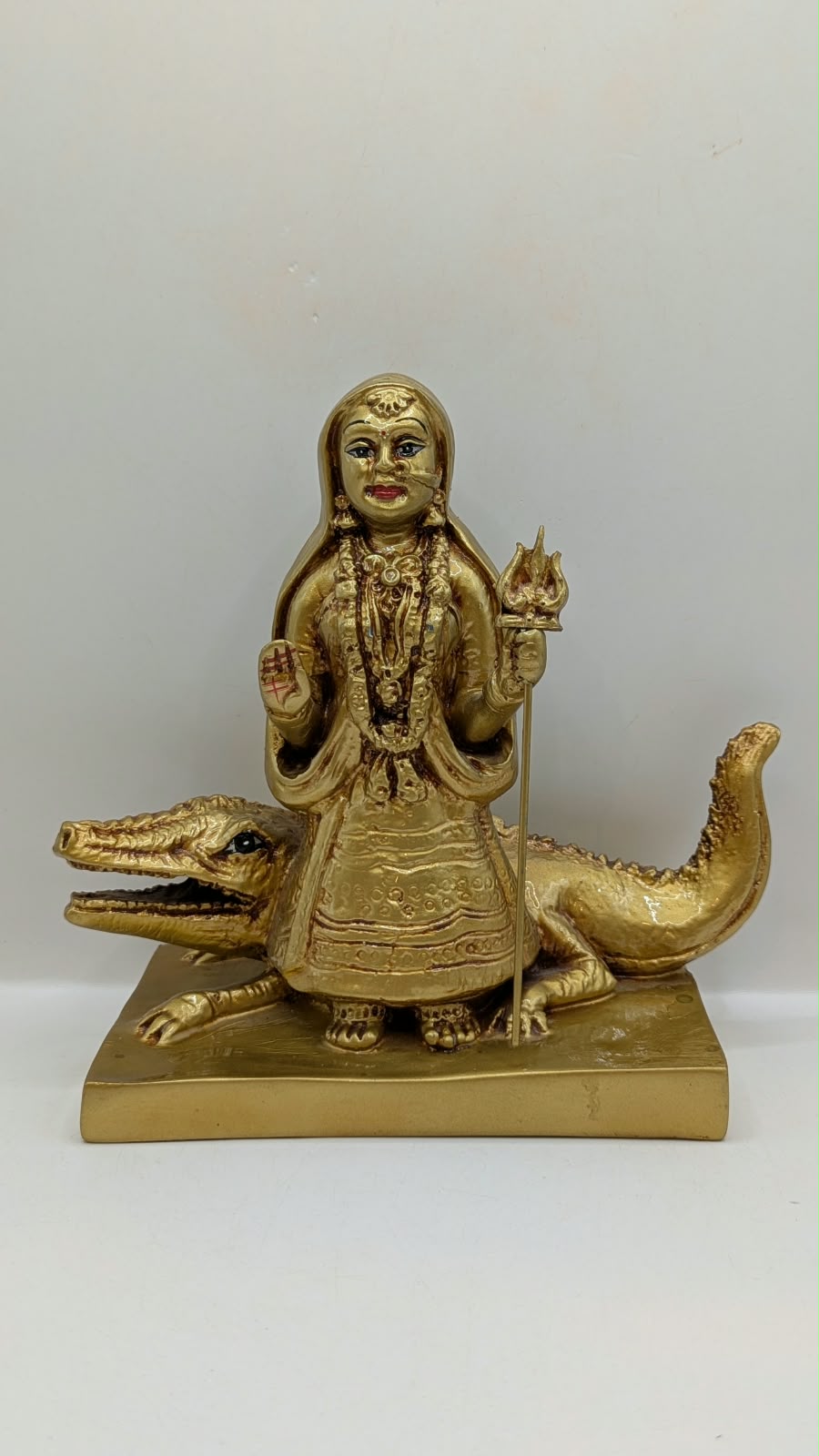 Gold Khodiyar Maa statue, front view