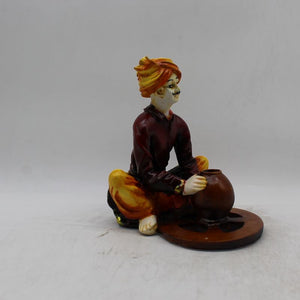 Rajasthani boy,Rajasthani man,Musician man Rajasthani statue, idol Maroon color