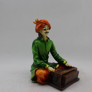 Rajasthani boy,Rajasthani man,Musician man Rajasthani statue, idol Green color