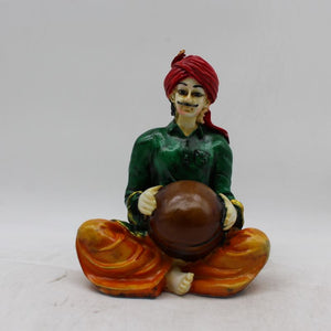 Rajasthani boy,Rajasthani man,Musician man Rajasthani statue, idol Green color