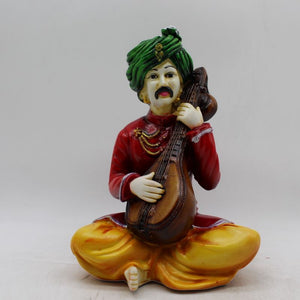 Rajasthani boy,Rajasthani man,Musician man Rajasthani statue, idol Red color