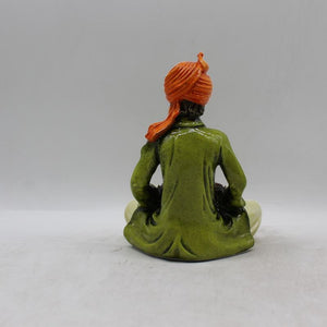 Rajasthani boy,Rajasthani man,Musician man Rajasthani statue, idol Green color