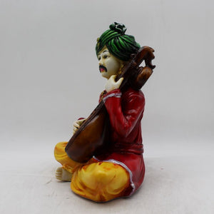 Rajasthani boy,Rajasthani man,Musician man Rajasthani statue, idol Red color