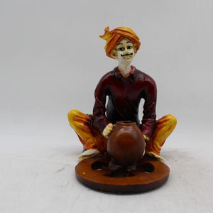 Rajasthani boy,Rajasthani man,Musician man Rajasthani statue, idol Maroon color