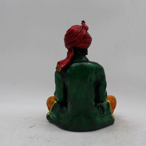 Rajasthani boy,Rajasthani man,Musician man Rajasthani statue, idol Green color